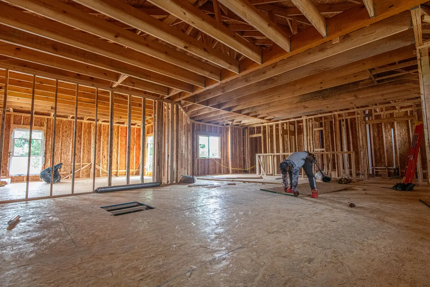 The timber frame of a new home under construction in a residential development in Texas